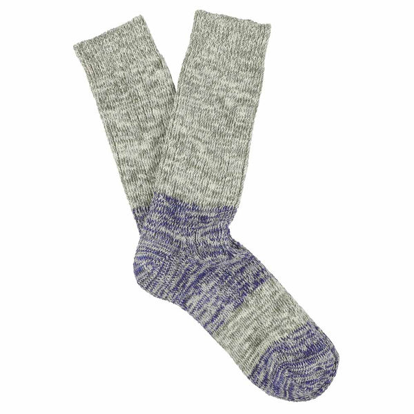 A pair of melange block socks in light grey and bright blue, crafted from cotton blend yarns and made in Portugal
