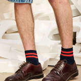 Man wearing Escuyer Men Striped Ankle Socks Ecru / Bright Blue with loafers — clean summer style