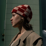 Checkered merino wool beanie shown in yellow and khaki colourway