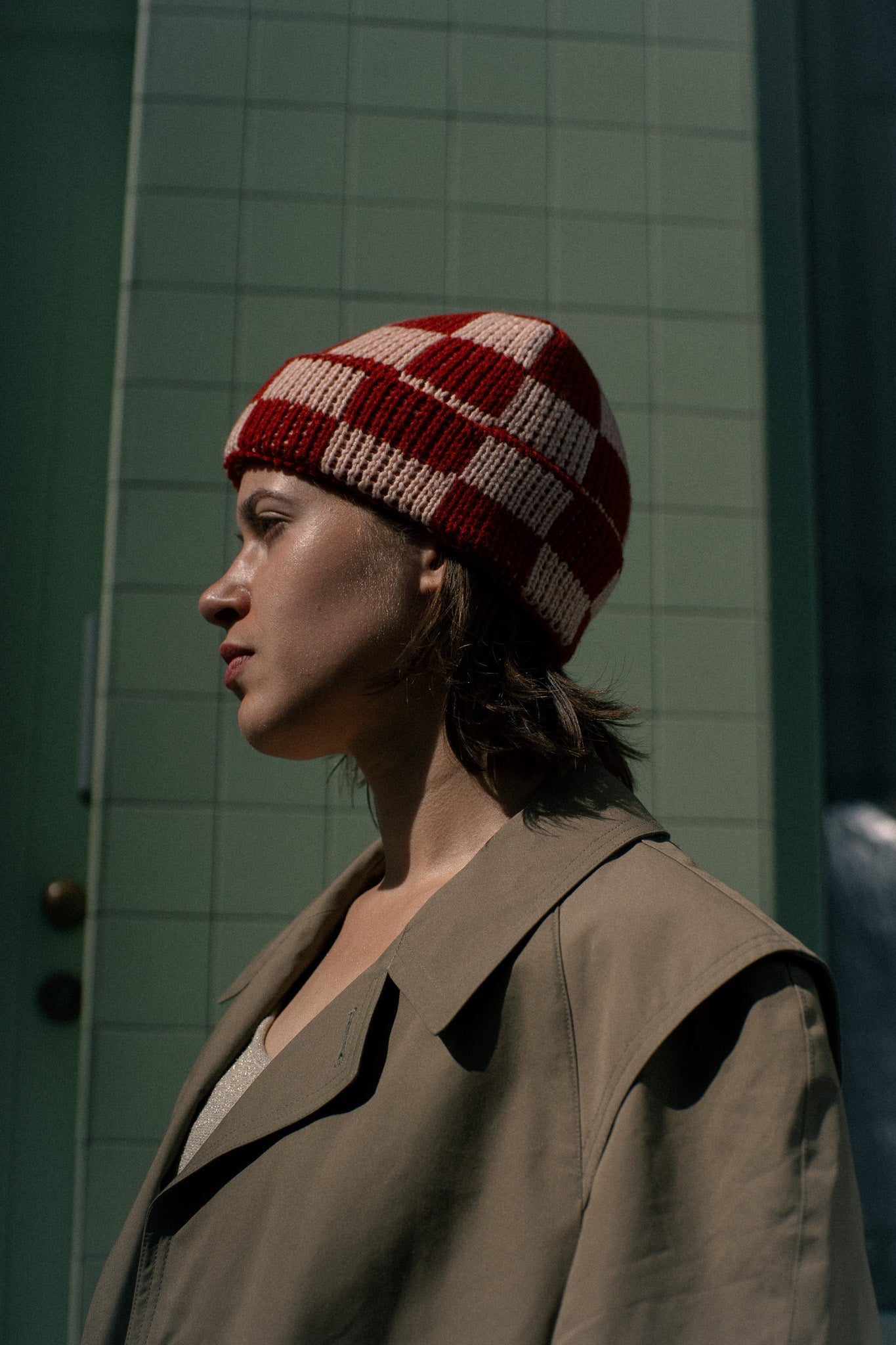 Checkered merino wool beanie shown in yellow and khaki colourway