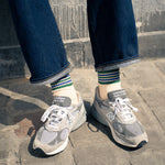 Escuyer Women's striped socks worn with New Balance sneakers — 5 Stripes collection, made in Portugal