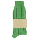 Close-up of Escuyer Golf Green cashmere crew socks showing soft knit texture — 10% cashmere, 38% virgin wool, GRS certified recycled polyamide