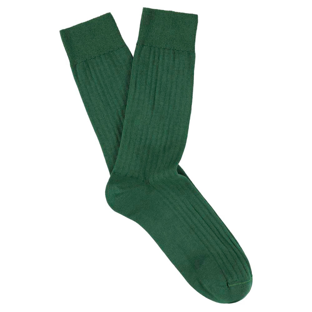 Pair of green socks on a white background