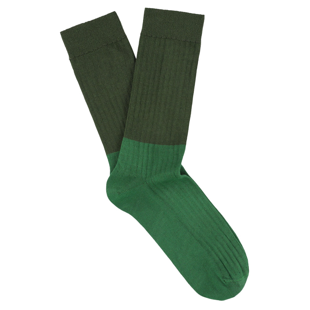 Green sock on a white background