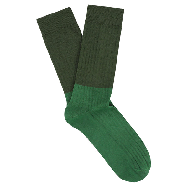 Green sock on a white background