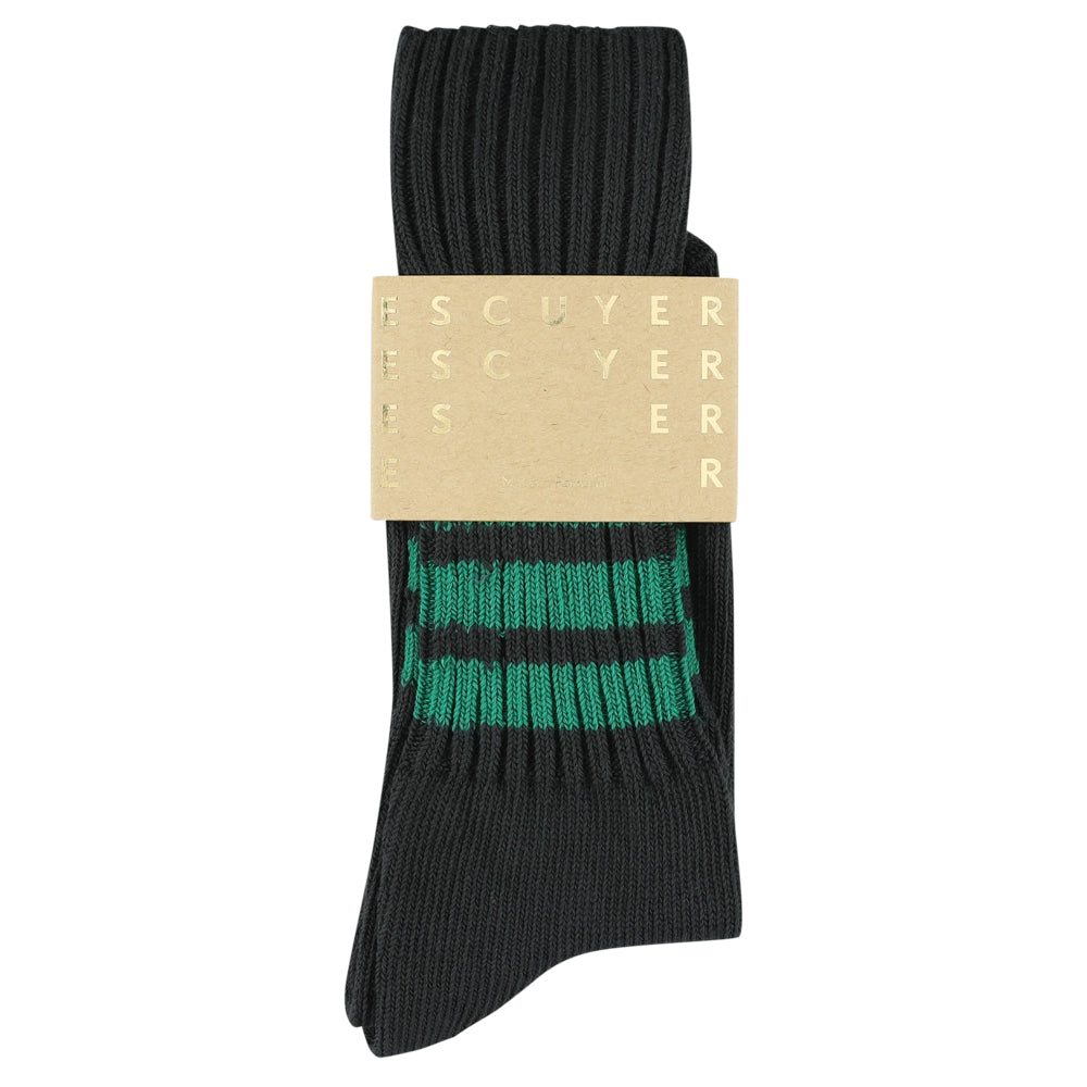 Black and green striped socks with a label on a white background