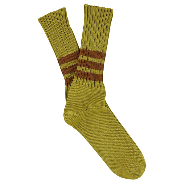Pair of green socks with brown stripes on a white background