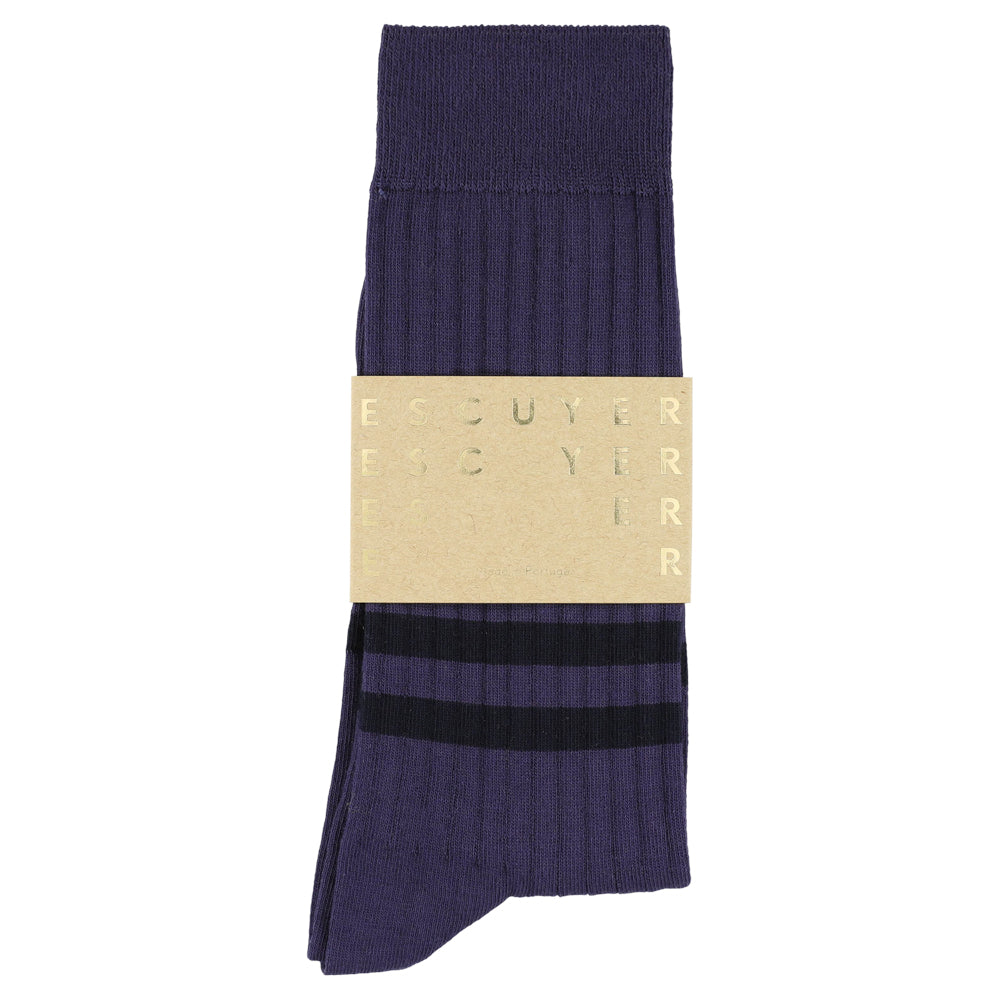 Navy sock with a beige label on a white background