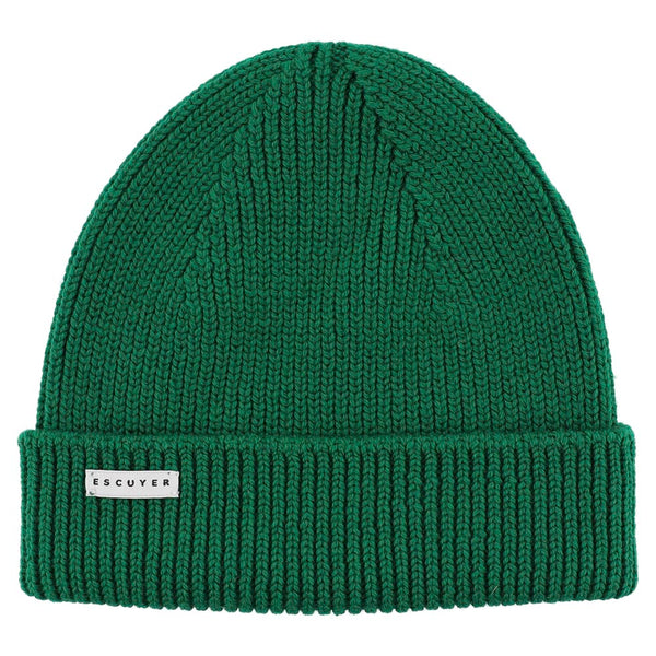 Green knit beanie with a visible brand label on a white background