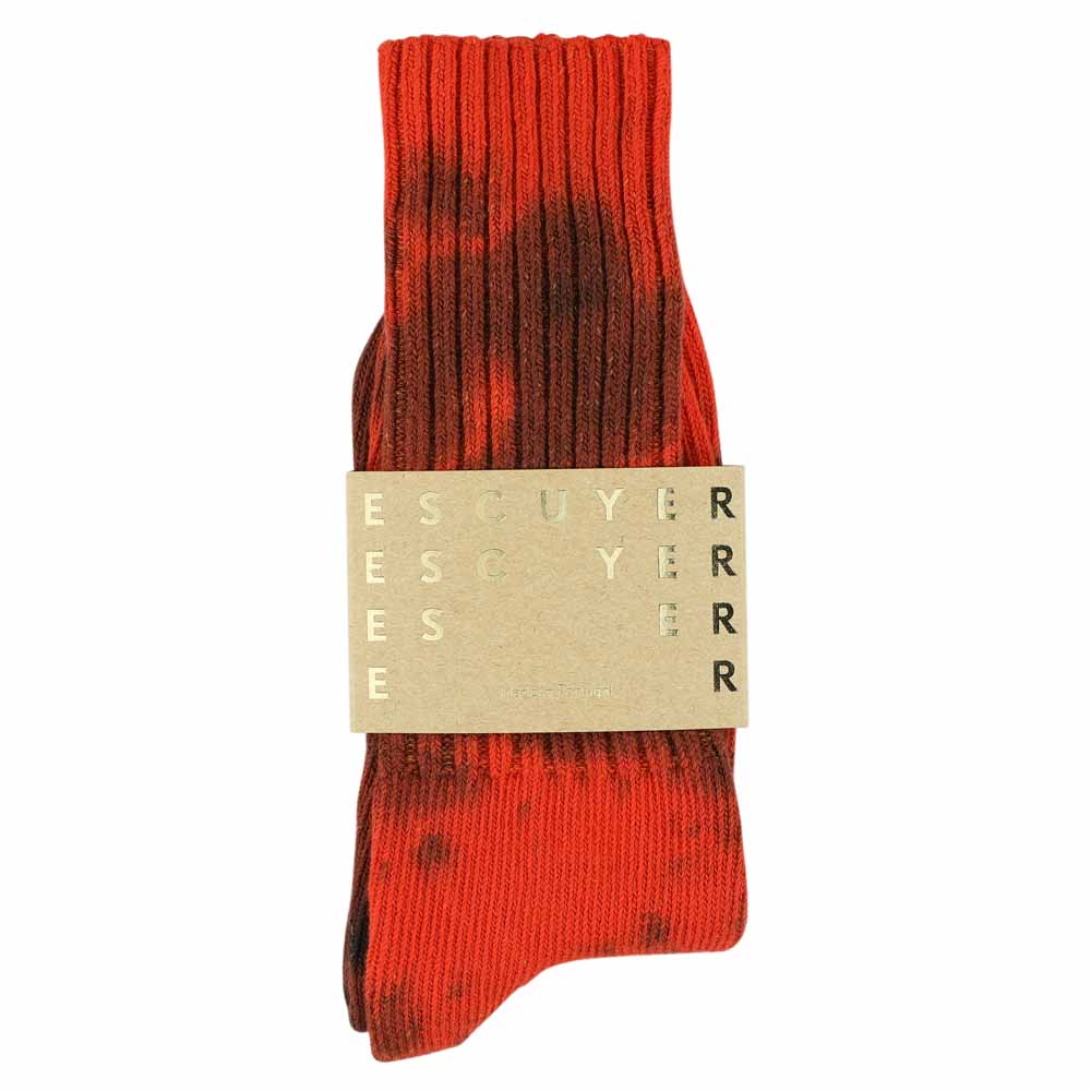 One-of-a-kind men's tie dye crew socks in orange and black, hand-dyed, made in Portugal by Escuyer