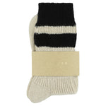 Close-up of Escuyer Ecru / Black women's striped cashmere socks — 10% cashmere, 38% virgin wool, GRS certified recycled polyamide