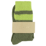Close-up of Escuyer Khaki / Lime women's striped cashmere socks — 10% cashmere, 38% virgin wool, GRS certified recycled polyamide