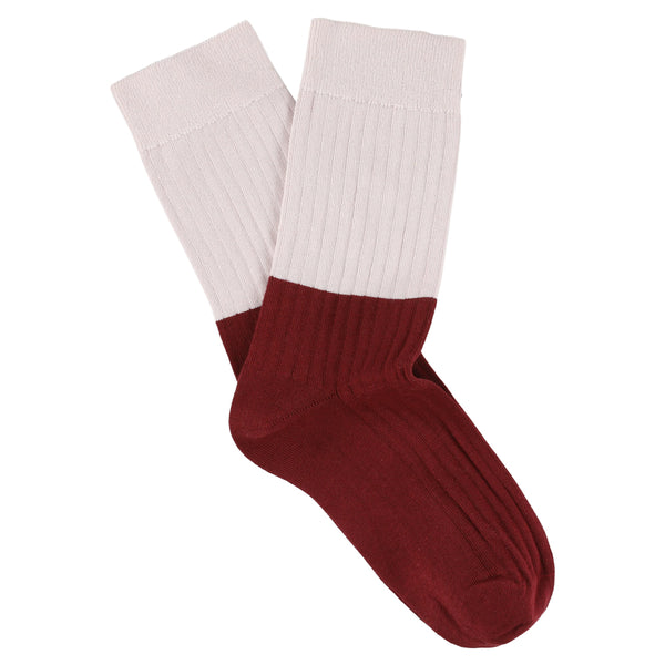 Maroon and white sock on a white background