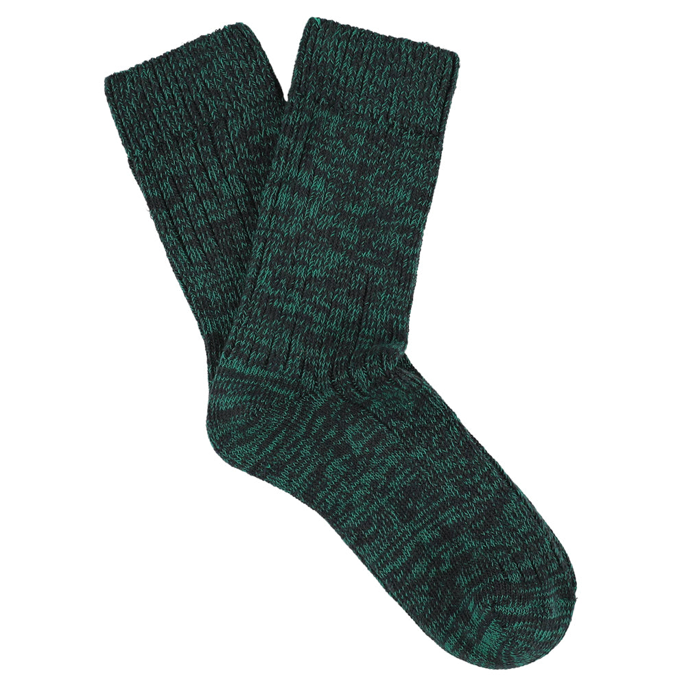 Pair of green socks on a white background
