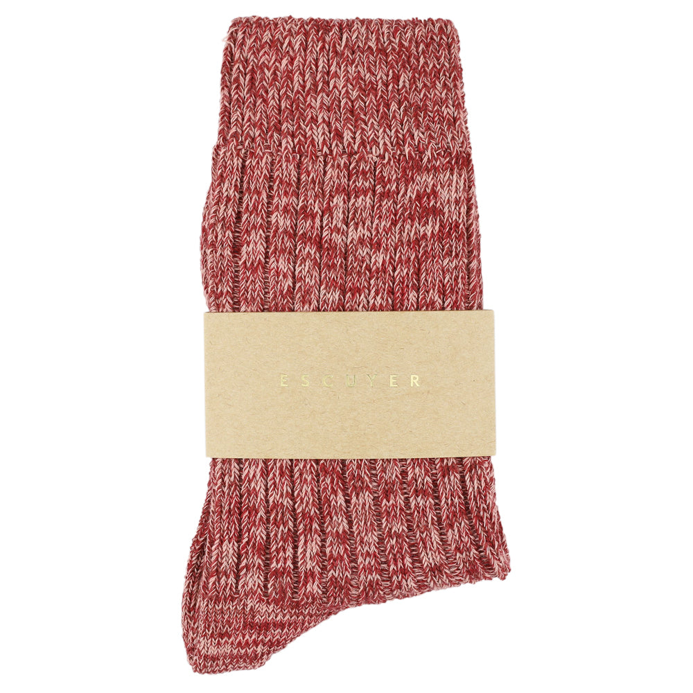 Red and white patterned sock with a beige band on a white background