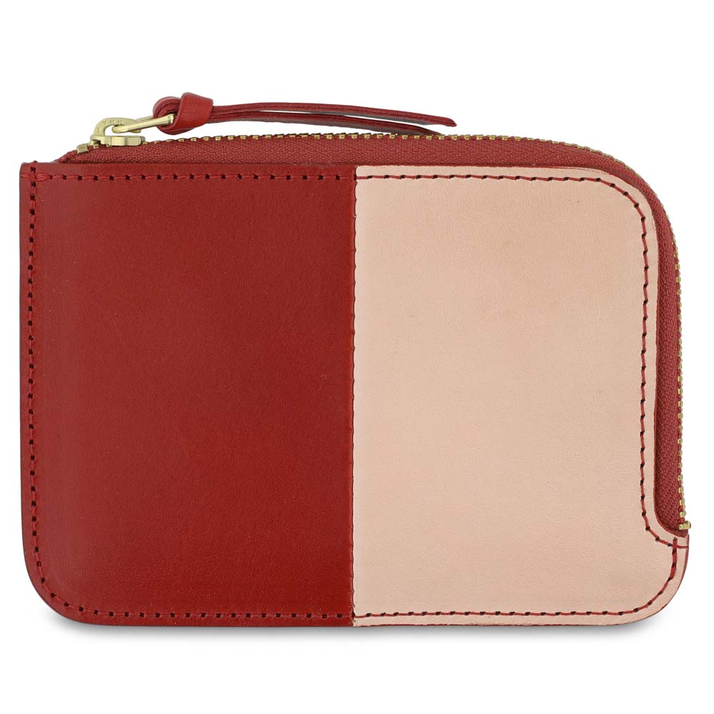 Escuyer pink and red zip wallet — vertical colour-block exterior, pink left, red right