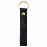Escuyer blue leather keychain — Italian vegetable tanned leather tab with gold metal ring and gold Escuyer logo