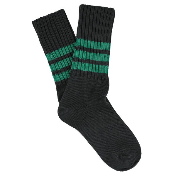 Black socks with green stripes on a white background