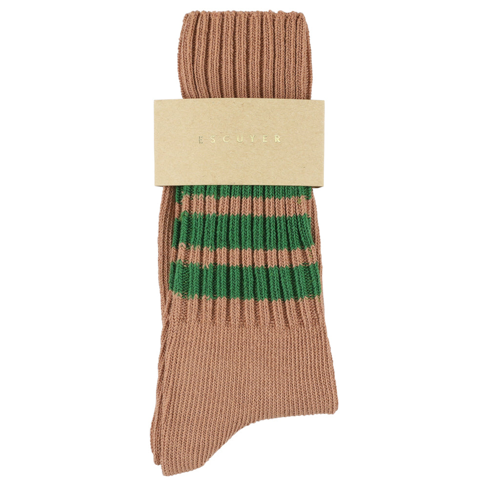 Pink sock with green stripes and a visible brand label on a white background