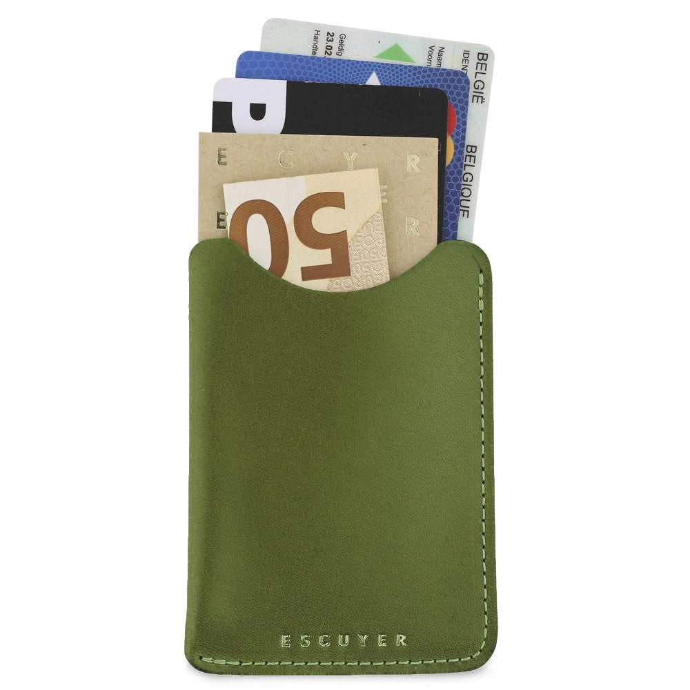 Escuyer jungle green leather card sleeve holding cards and a folded banknote — holds up to 8 cards