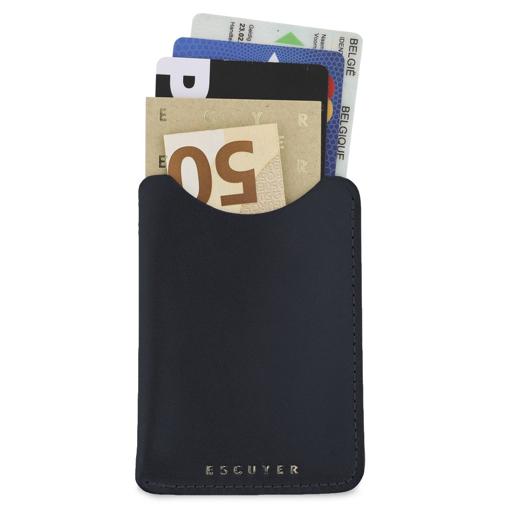 Escuyer navy blue leather card sleeve holding cards and a folded banknote — holds up to 8 cards