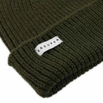 Side view of khaki ribbed merino wool beanie with folded cuff