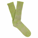 One-of-a-kind men's tie dye crew socks in spring green, hand-dyed, made in Portugal by Escuyer