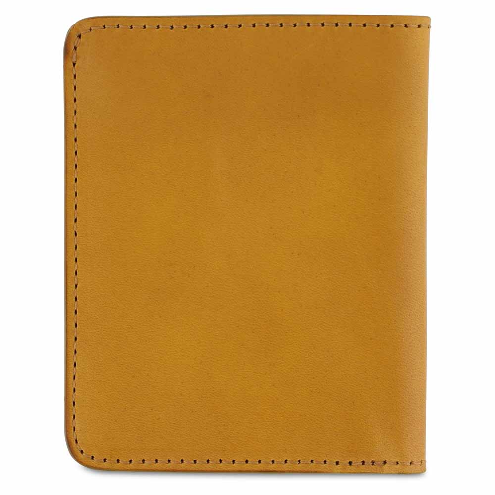 Escuyer mustard slim wallet showing bill sleeve in natural leather interior