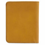 Escuyer mustard slim wallet showing bill sleeve in natural leather interior